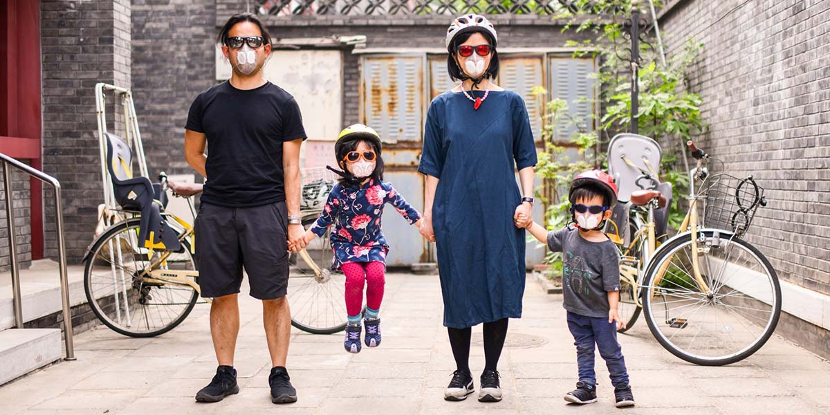 Chow's family wearing Totobobo mask